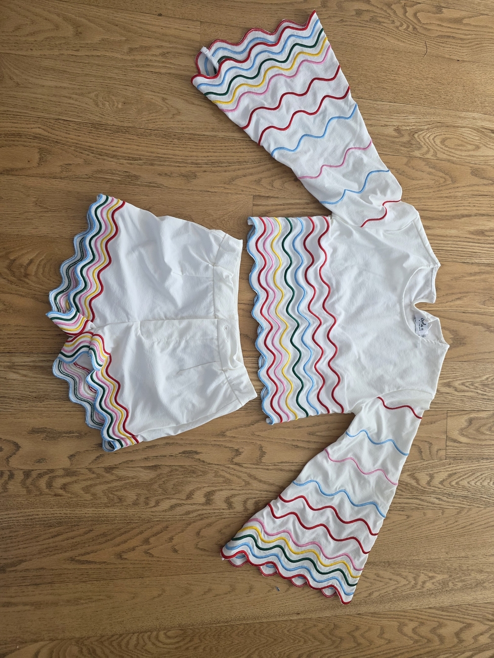 Lola + The Boys White Top And Shorts Set with Rainbow Wavy Trim